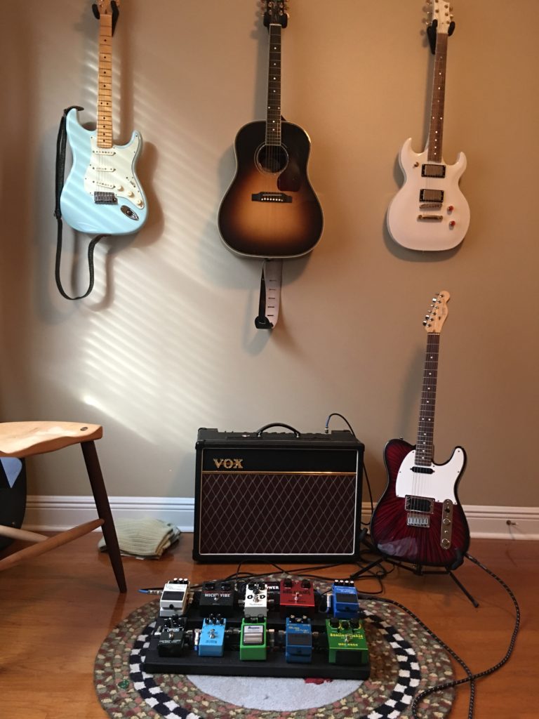 Andrew's guitar rig with pedal board